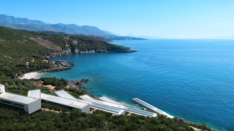 zig-zag resort extends linear terraces and infinity pools along albania’s rugged coastline