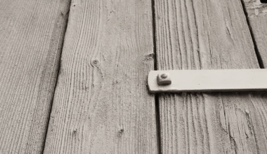 a gif of wooden doors rattlign