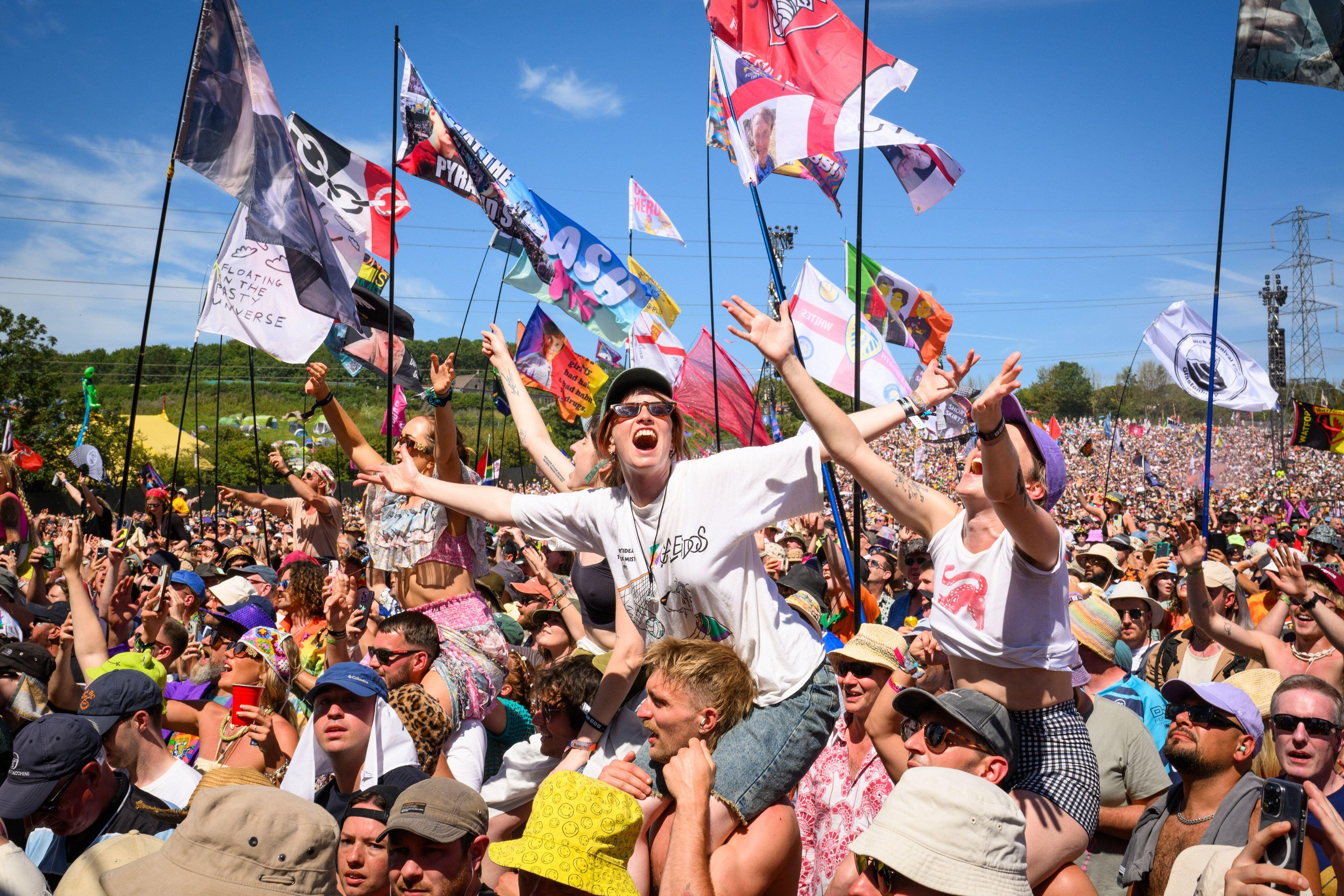 Crowd at Glastonbury Festival watching Cyndi Lauper perform.