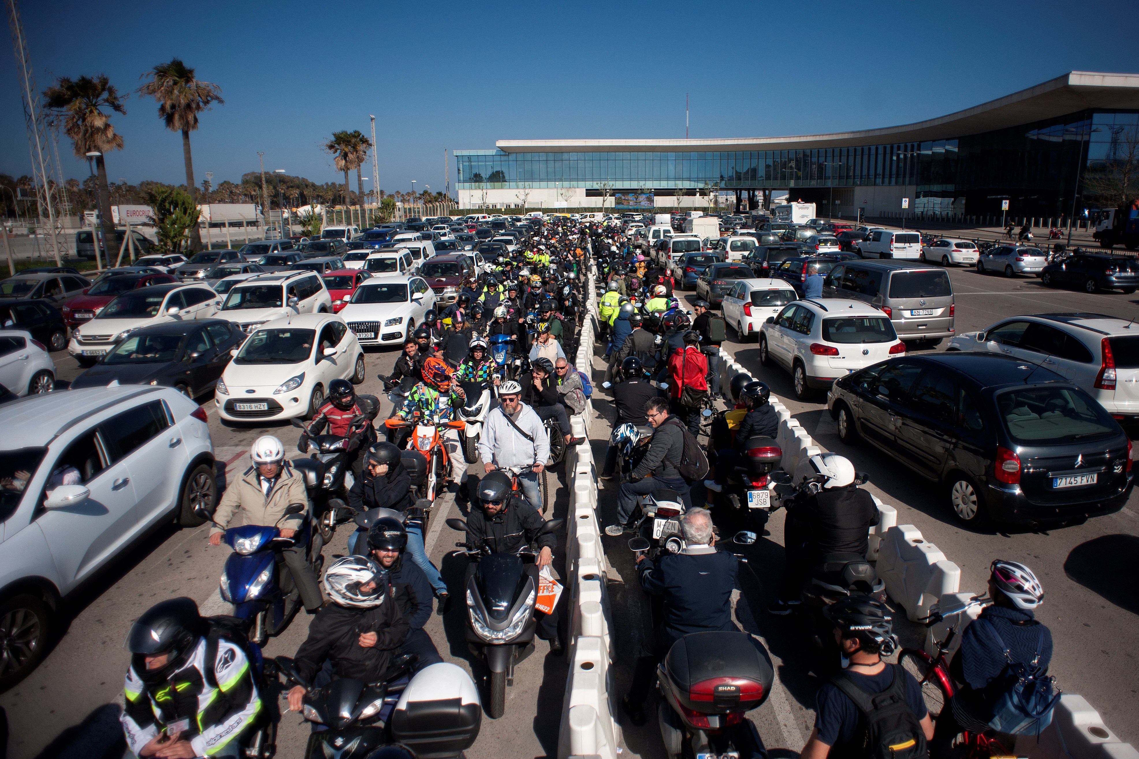 Vehicles and motorcyclists queue at the Gibraltar border.