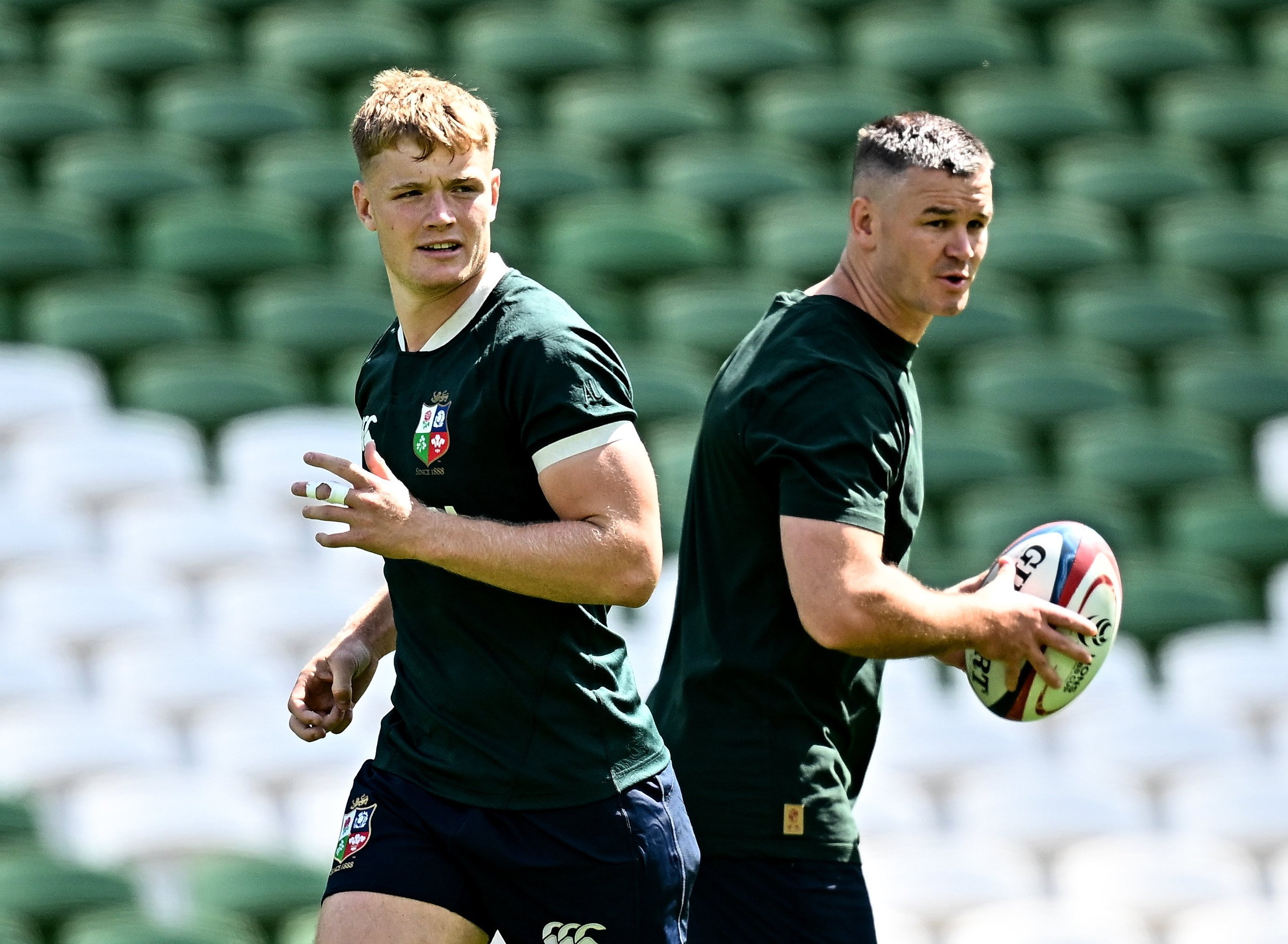 Fin Smith and Jonathan Sexton at a British & Irish Lions captain's run.
