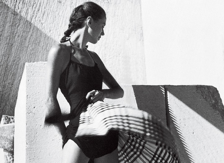 The model Sabine wears a skirt and swimsuit by Claire McCardell.