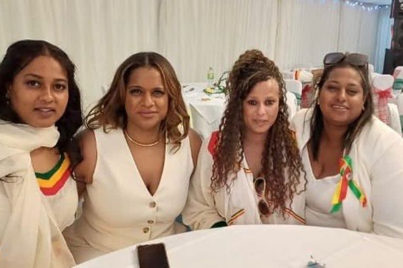 A "devastated" Birmingham family say they face an "impossible" future after their mum died suddenly. Sutton Coldfield construction manager and mum-of-five Ola Lindo died on June 7 2025. Pictured: Ola on far right -Credit:Lei Scott