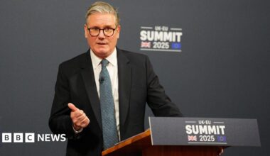 Sir Keir Starmer gives a press conference from behind a podium reading "UK-EU summit 2025".
