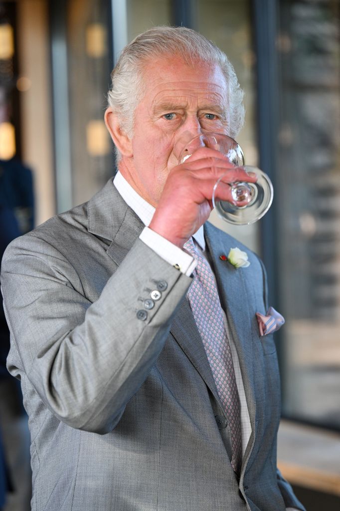 King Charles III tastes wine during a visit to Chateau Smith Haut Lafitte