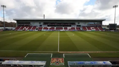 Getty Images A wide view of the East Stand at Sixfields Stadium with the pitch in view in the foreground