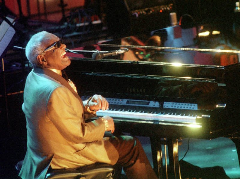 Singer Ray Charles performs a tribute to Rock and Roll Hall of Fame inductee Nat King Cole during ceremonies in New York on May 6, 2000. Charles died on this day in 2004. File Photo by Ezio Petersen/UPI