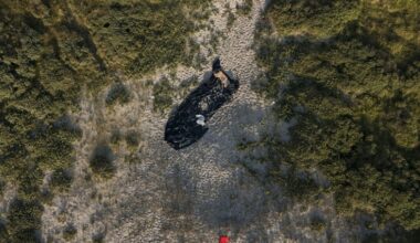 A deflated dinghy on a French beach (Sameer Al-DOUMY)
