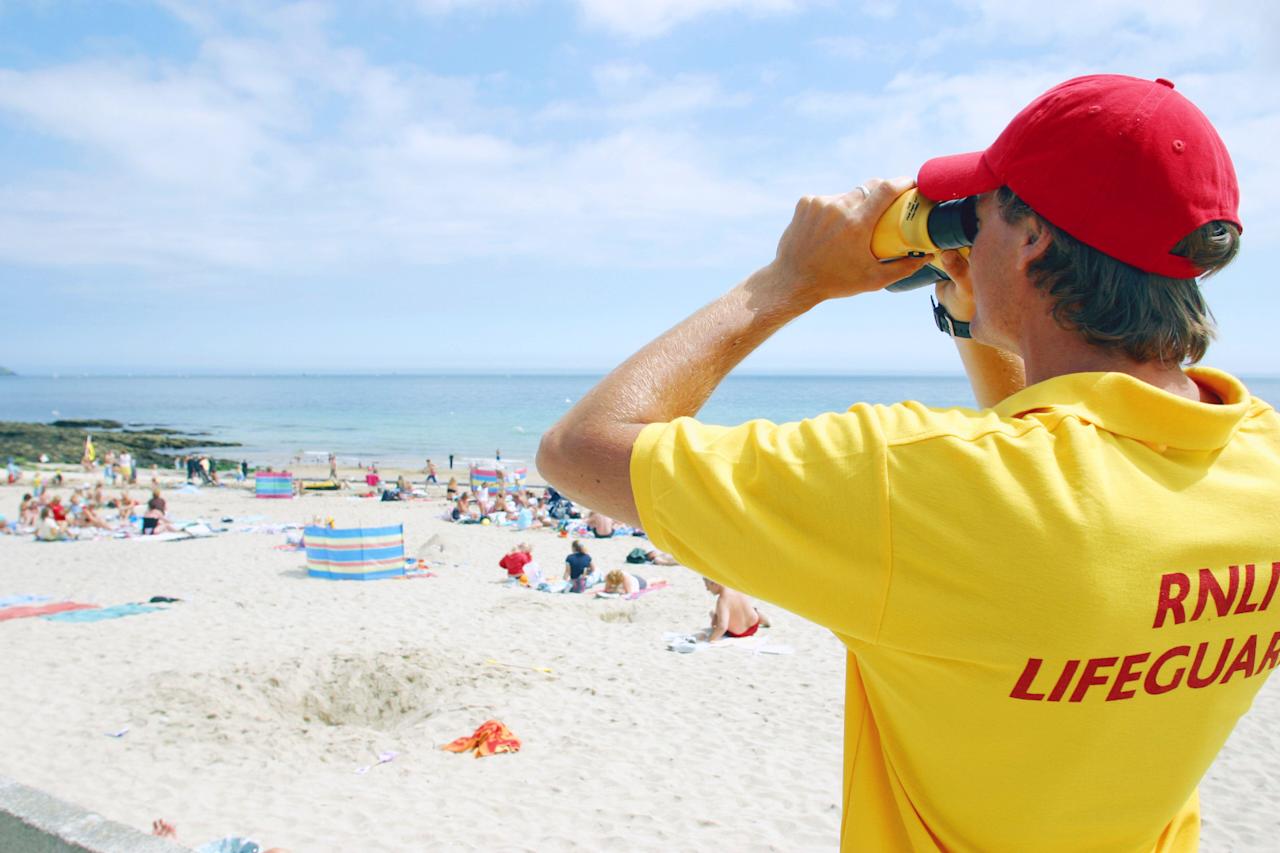 June 5, 2004, United Kingdom: RNLI Beach Lifeguard, Gyllynvase Beach, Falmouth, Cornwall, UK (Credit Image: © Mike Greenslade/VW Pics via ZUMA Press Wire)
