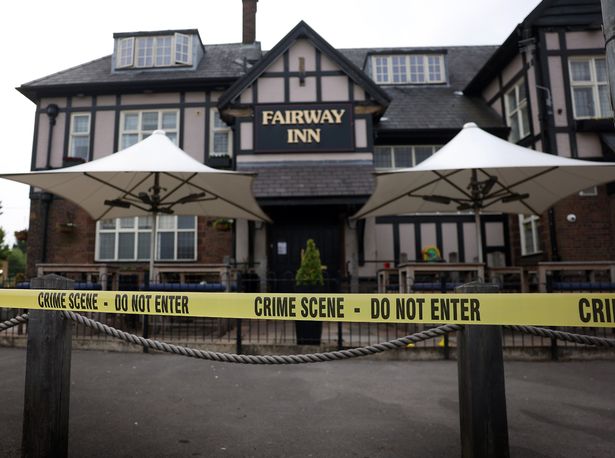 Police outside the Fairway Inn
