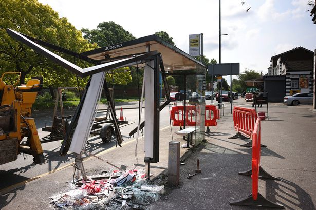 The bus stop was left smashed up following the serious collision