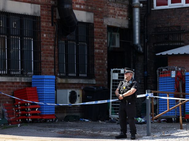 Officers at a cordon on Norbury Street, Stockport