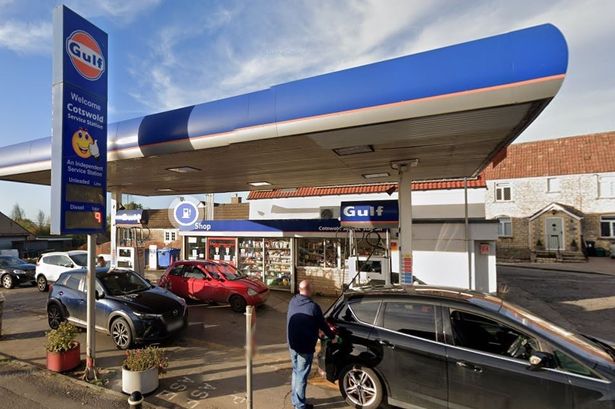 Petrol station and shop with blue signs