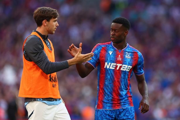 Marc Guehi and Nico Gonzalez at the end of  the Emirates FA Cup Final match between Crystal Palace and Manchester City at Wembley Stadium. 