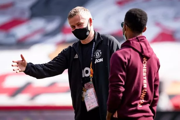 Ole Gunnar Solskjaer chats to Amad