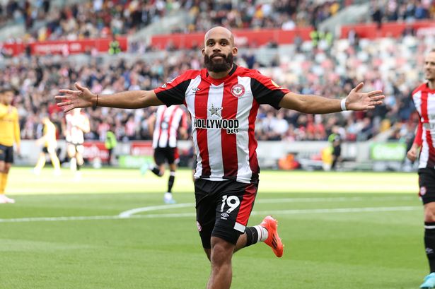 Bryan Mbeumo celebrates after scoring for Brentford at the Gtech Community Stadium.