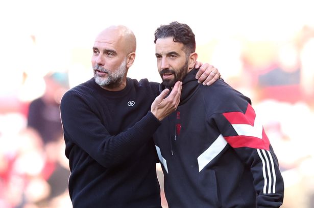 Pep Guardiola, Manager of Manchester City, embraces Ruben Amorim