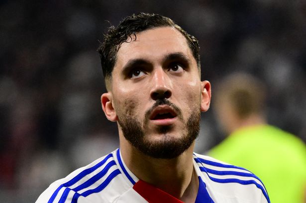 Lyon's French midfielder #18 Rayan Cherki celebrates