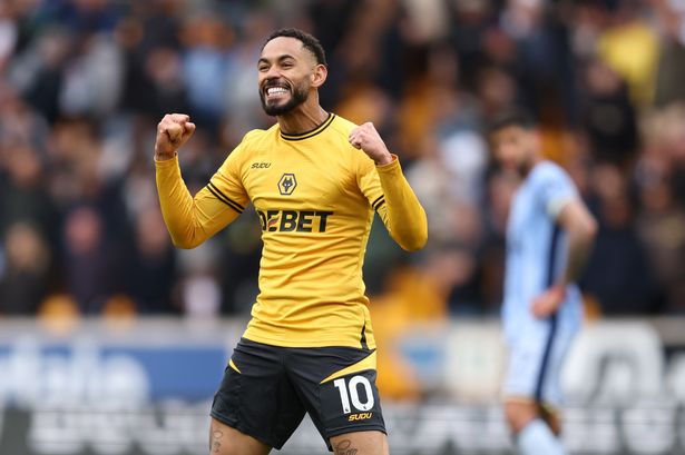 Matheus Cunha celebrates after scoring for Wolves.