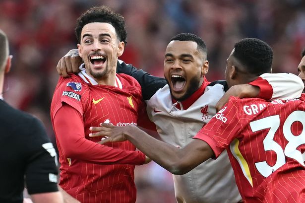 Liverpool trio Curtis Jones, Cody Gakpo and Ryan Gravenberch celebrate winning the Premier League title