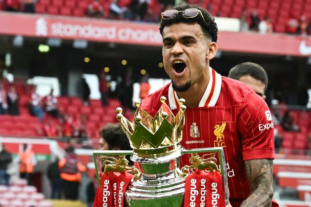 Liverpool's Luis Diaz celebrates with the Premier League trophy
