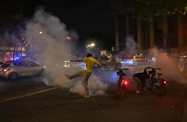 Clashes break out between police and fans as supporters 