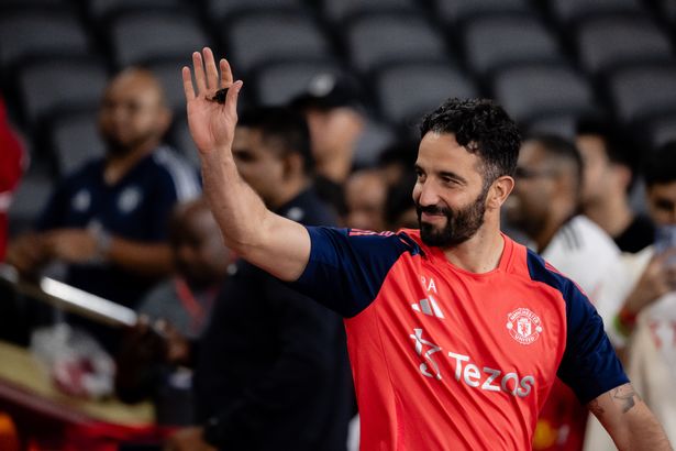 Manchester United head coach Ruben Amorim waves to the fans in Malaysia.