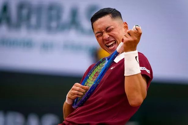 Tokito Oda of Japan celebrates winning the French Open