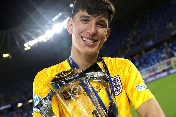 James Beadle holds with the UEFA European under-21 Championship trophy after victory with England.