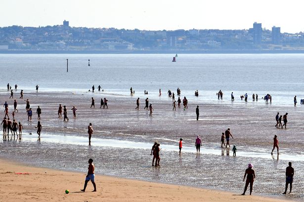 Heatwave weather on Crosby Beach.