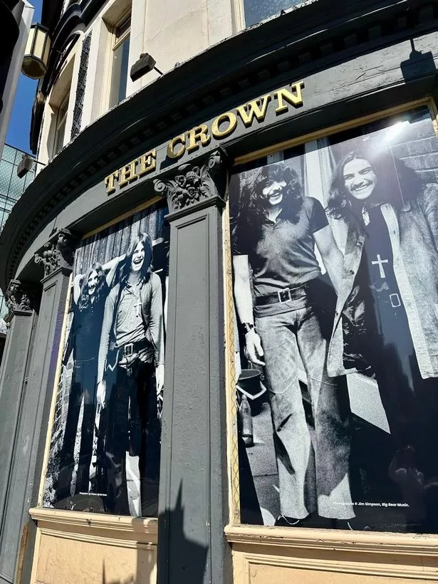Jim Simpson's pictures have gone up on the front of Station Street pub The Crown