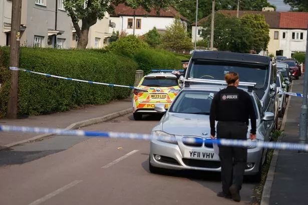 Police at the scene of the cordon on Nevin Road