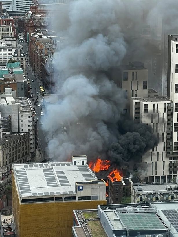 Smoke billowed overhead and covered parts of the city centre