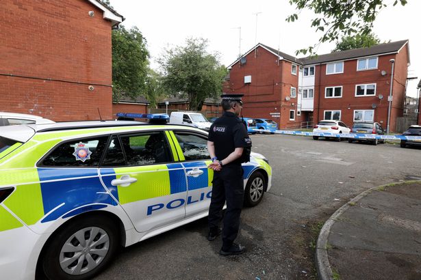 A cordon in place on Durden Mews, Shaw