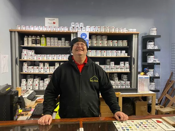 Eddy Flynn, 55, who created the Bootle Tool Shed stood at the front desk