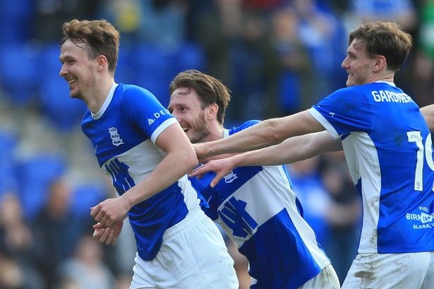 Kieran Dowell (left) celebrates a Birmingham City victory with Ben Davies (centre) and Taylor Gardner-Hickman