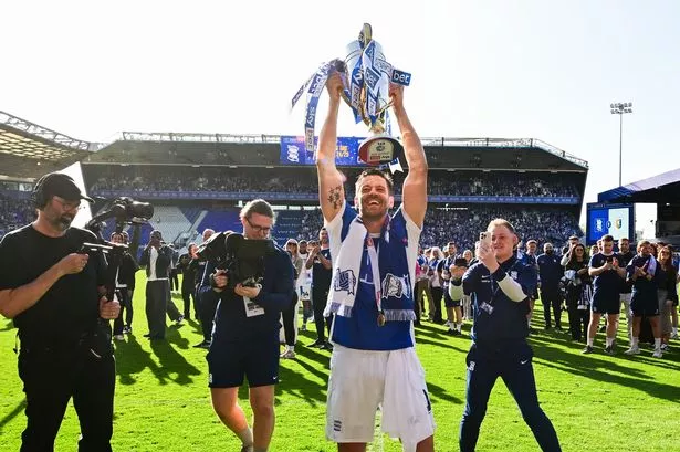 Lukas Jutkiewicz of Birmingham City celebrates with the EFL League One trophy