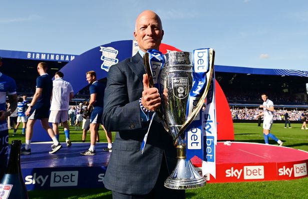 Birmingham City chairman Tom Wagner holds the League One trophy