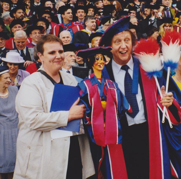 Siblings Martin and Carole Dawber, who live in Birkdale, have fond memory of their time as art students in 70s Liverpool at Liverpool College of Art, now part of LJMU. Pictured, Carole with Sir Ken Dodd & Diddy Man at their appointment as LJMU Honorary Fellows at Liverpool Anglican Cathedral wearing the academic robes that she designed especially for them both to wear