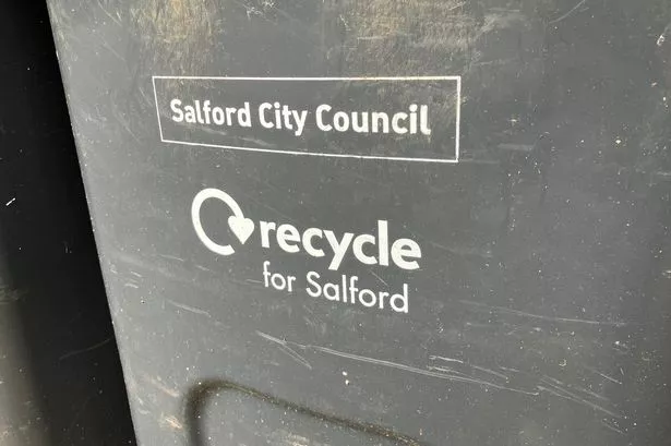 Salford's pink-lidded bins for food and garden waste are emptied each week - some want the same for domestic waste.
