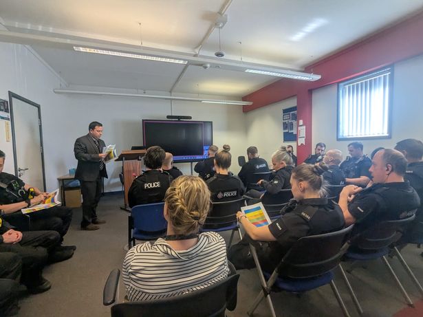 DI Chris Preston delivers a briefing at Wigan Police Station ahead of a day of DAPO checks