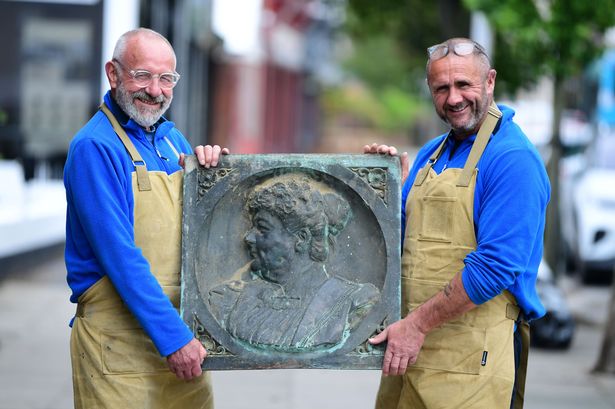James Loft (left), and son John from The Loft Upholstery, Crosby, with the bronze plaque of Mary Poulsom