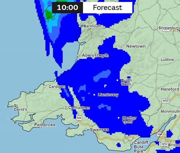A weather map of Wales with large blue patches indicating rainfall