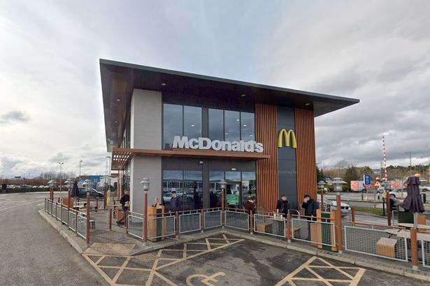 An image of the exterior of a modern McDonald's restaurant.