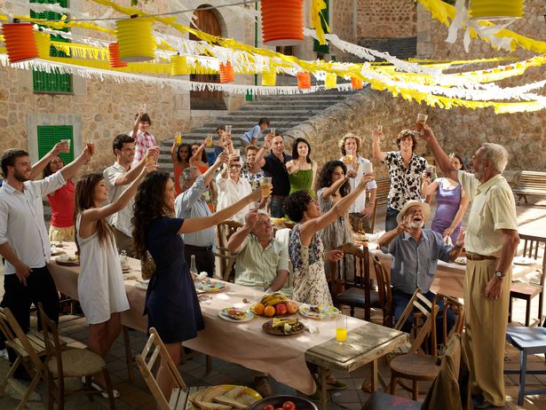 A group of people socialising and celebrating