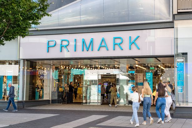 Birmingham, UK - People outside the exterior of a Primark shop in Birmingham's city centre.