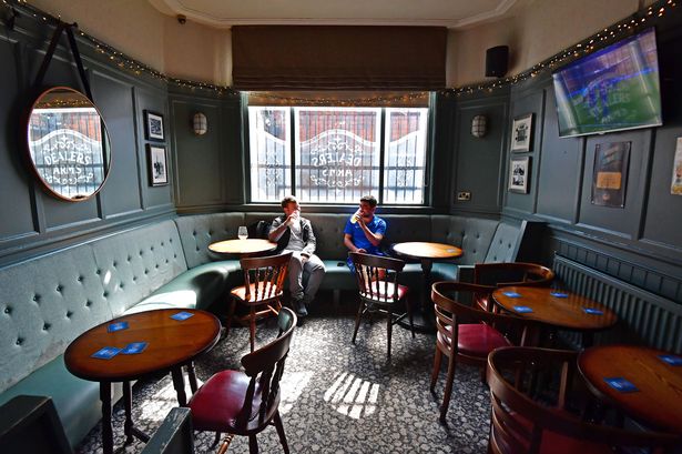 Customers inside The Dealers Arms