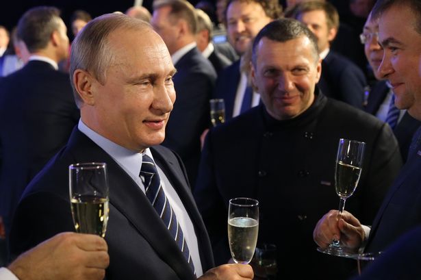 Vladimir Solovyov schmoozes with Putin