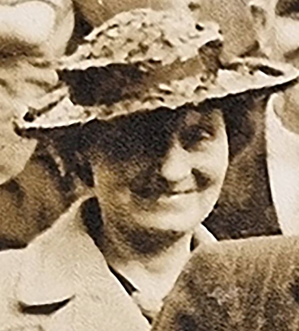 An old sepia-tinted picture of a woman