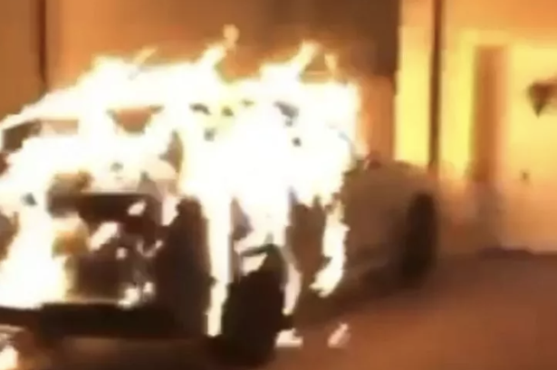 Masked figures firebombed several properties.